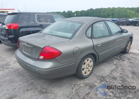 2001 Ford Taurus Lx z USA, uszkodzony, nr VIN 1FAFP52U61A207125